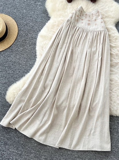 French-style sexy halter neck sleeveless top, high-waisted, heavily embellished with rhinestones, and flowing skirt set.