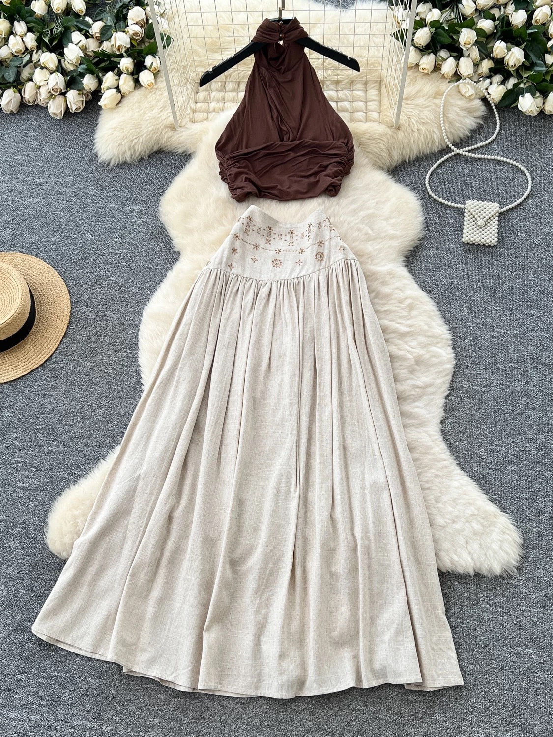 French-style sexy halter neck sleeveless top, high-waisted, heavily embellished with rhinestones, and flowing skirt set.