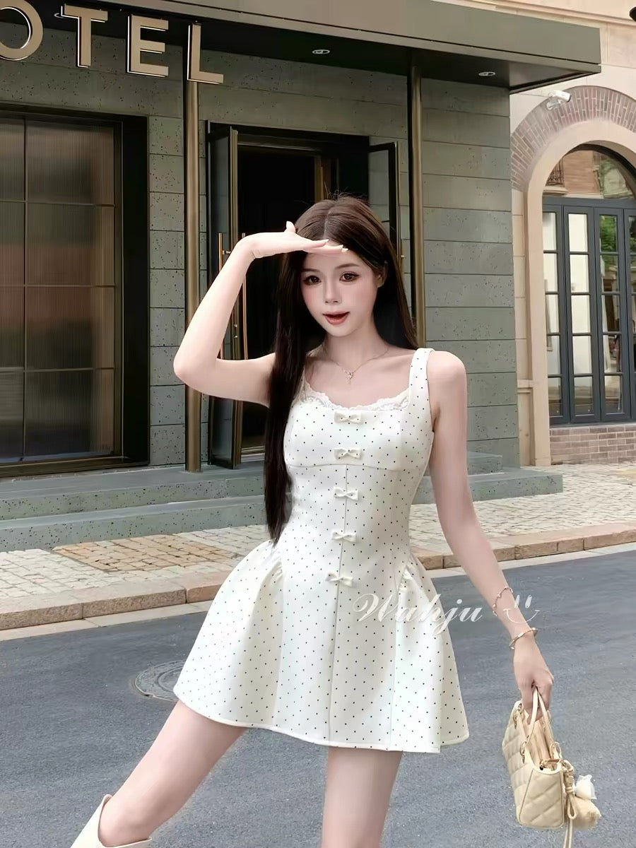 WAHJU Polka Dot Ripple Summer A-line Sundress with Lace Trim Neckline and Polka Dot Print.