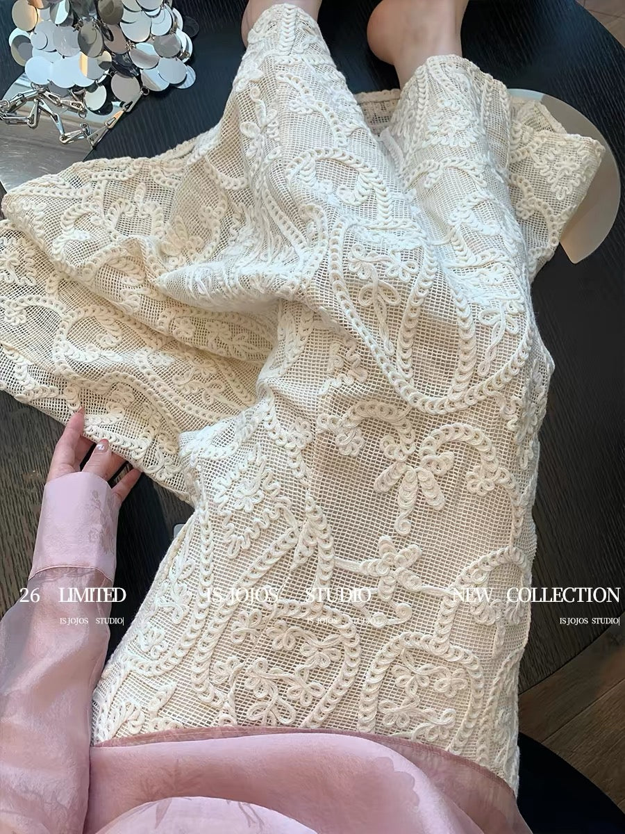 French-style hollowed-out crochet bodycon midi skirt, women's spring 2026 new style, high-end slimming and elegant fishtail skirt.