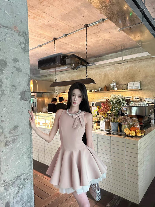 Barb Chill's elegant and youthful style summer birthday dress, sleeveless vest dress.