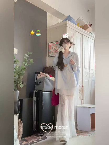 Iceland mousse loose light blue shirt long lace skirt pure sweet and spicy style vacation travel outfit for women