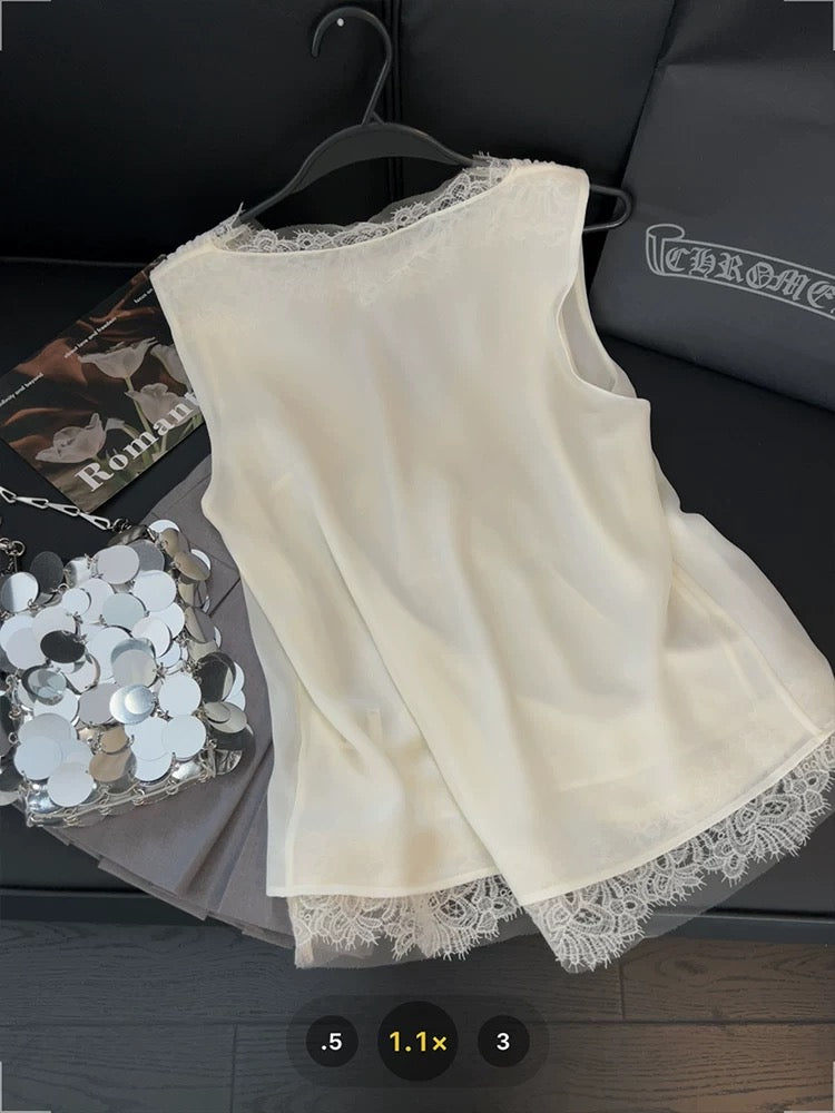 French-style lace-trimmed vest with mesh crossover design, a gentle V-neck sleeveless top perfect for summer 2025.