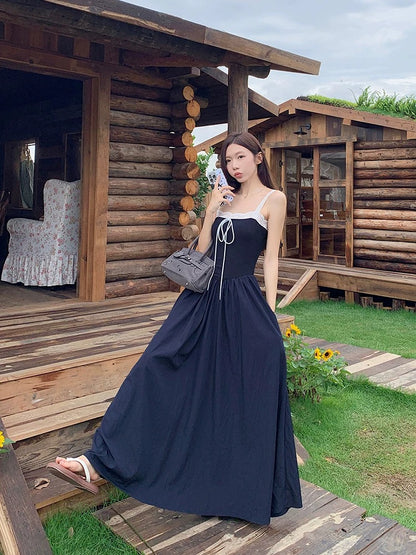 Dress design niche lace splicing strappy suspender skirt female summer chic waist slimming A-line long skirt
