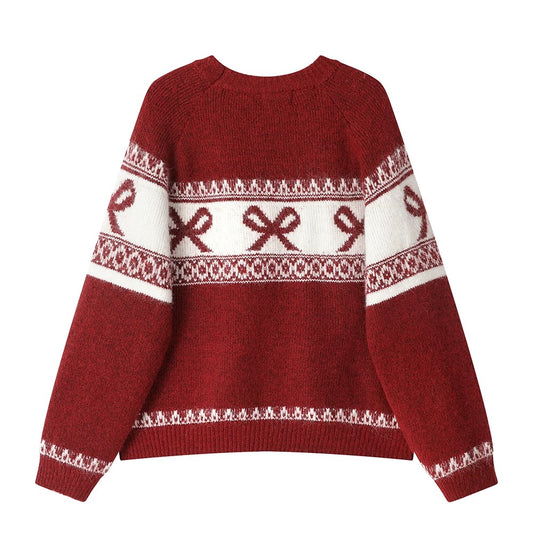 XinmonLee's high-end, super-good-looking soft and glutinous jacquard bow Christmas sweater is a chic winter top that reduces age.