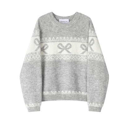 XinmonLee's high-end, super-good-looking soft and glutinous jacquard bow Christmas sweater is a chic winter top that reduces age.