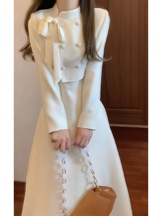 A sophisticated, Chanel-inspired, faux two-piece long-sleeved dress exuding French elegance, perfect for important occasions. (Winter 2025)