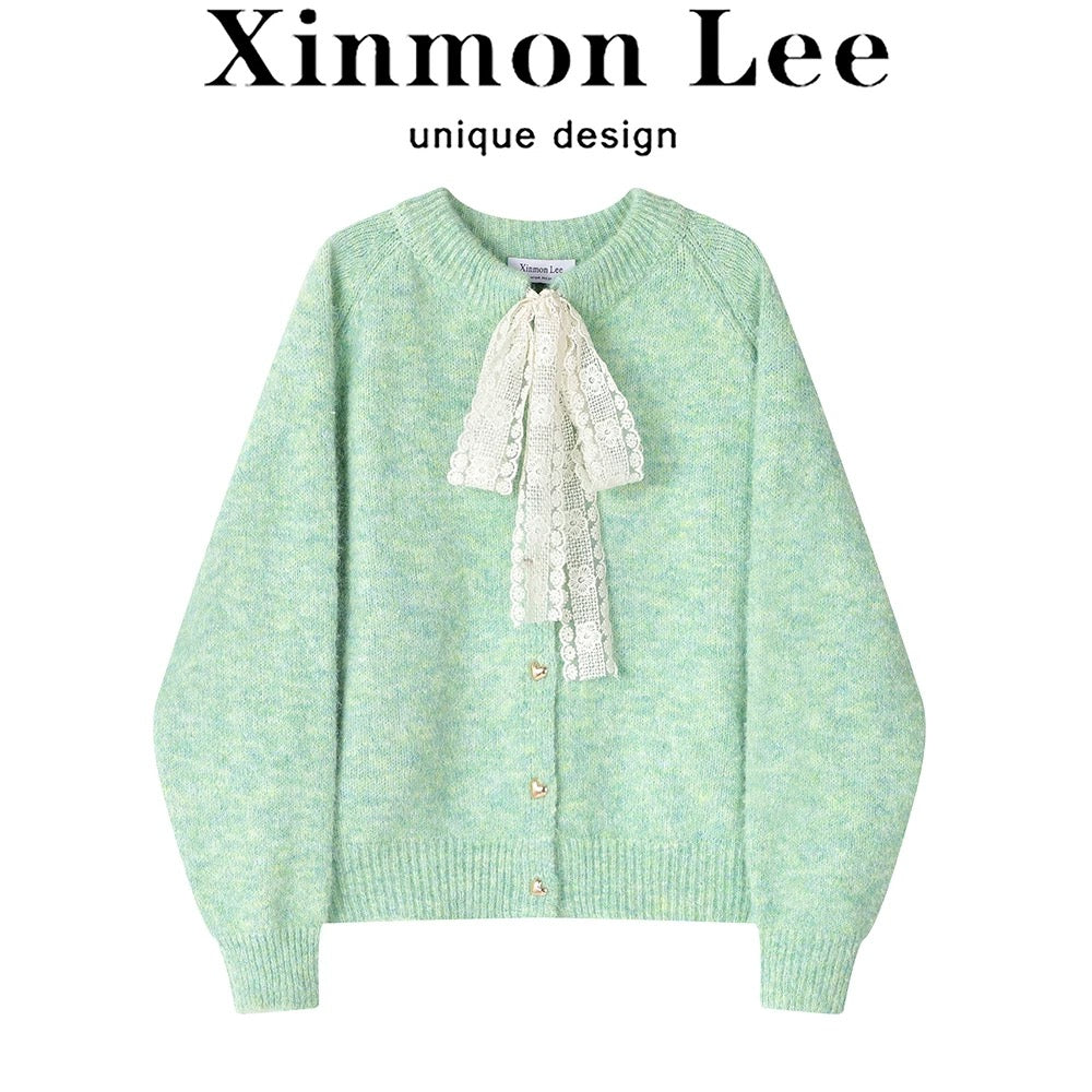 XinmonLee's stylish and elegant round-neck sweater with bow tie and fashionable winter sweater