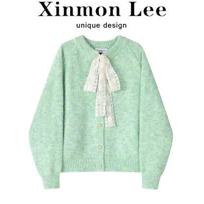 XinmonLee's stylish and elegant round-neck sweater with bow tie and fashionable winter sweater