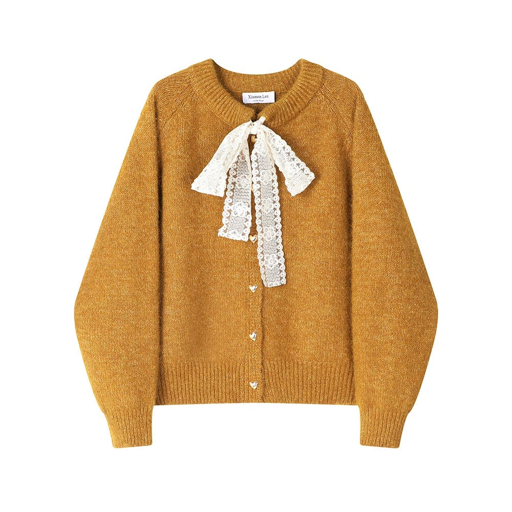 XinmonLee's stylish and elegant round-neck sweater with bow tie and fashionable winter sweater