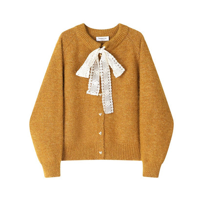 XinmonLee's stylish and elegant round-neck sweater with bow tie and fashionable winter sweater