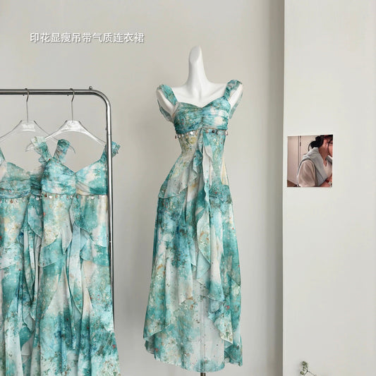 A sweet peach yikett "Summer in the Forest" suspender temperament dress female summer print slim long skirt