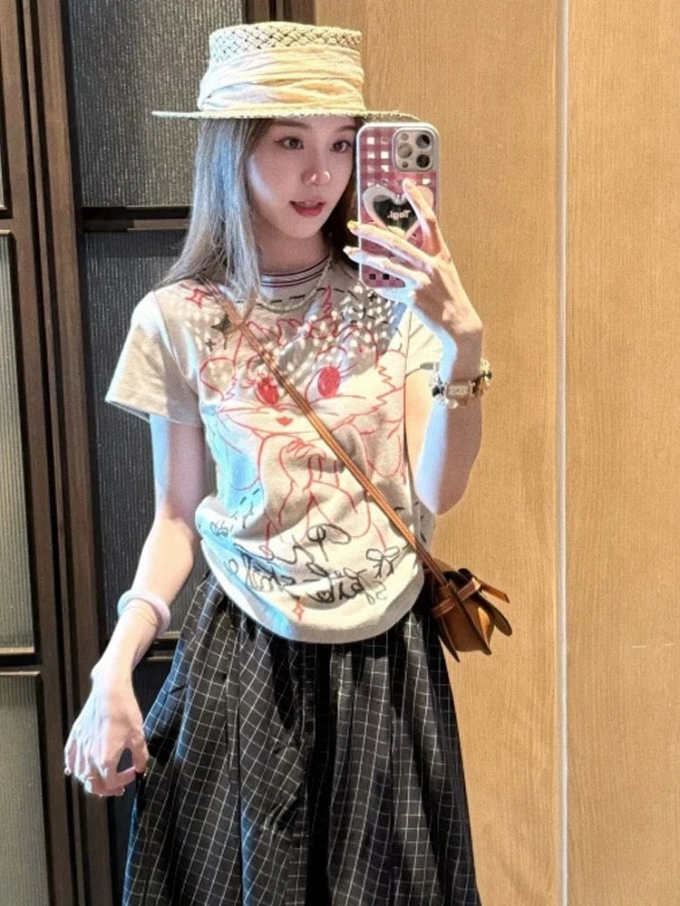 Cartoon print round neck straight shoulder short sleeve t-shirt female 2025 new summer loose unique super beautiful tops