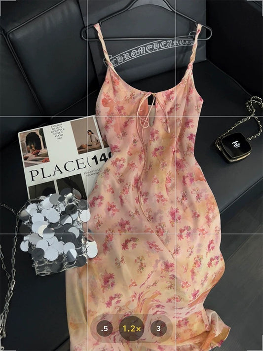 French-style tie-dye floral print sundress, exuding a gentle and sophisticated charm, a niche, elegant long dress perfect for Spring 2025.
