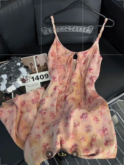 French-style tie-dye floral print sundress, exuding a gentle and sophisticated charm, a niche, elegant long dress perfect for Spring 2025.