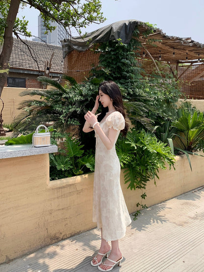 Qiu Rouyao elegant round neck pleated puff sleeve dress for women summer new slim white long and short skirt