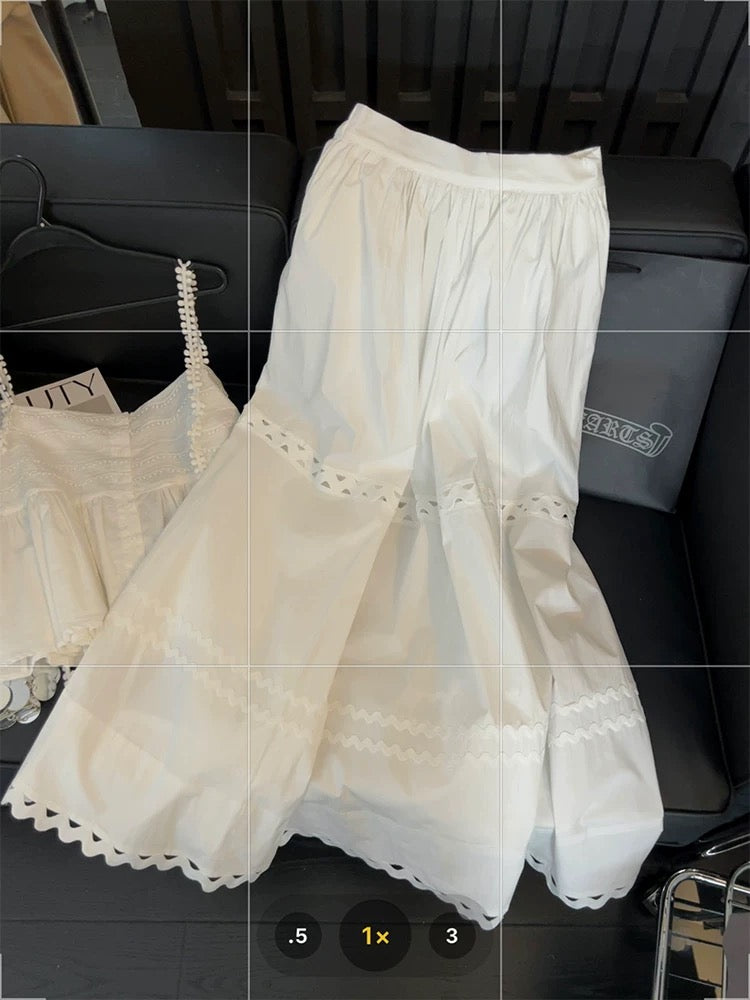 White lace two-piece suit for women, featuring a sweet and spicy style, a unique design, a halter top, and a hollowed-out A-line skirt.