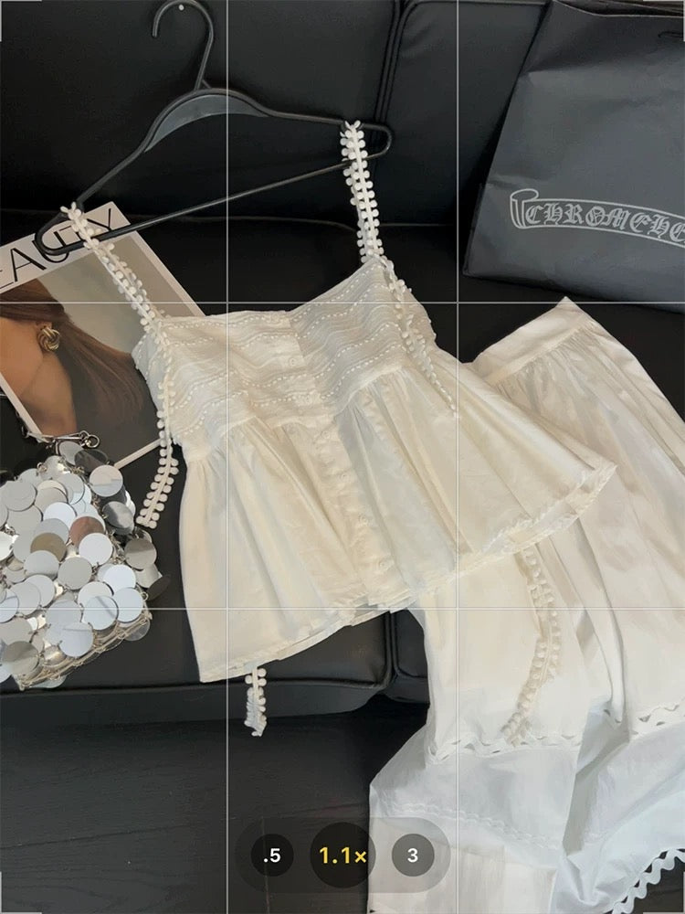 White lace two-piece suit for women, featuring a sweet and spicy style, a unique design, a halter top, and a hollowed-out A-line skirt.