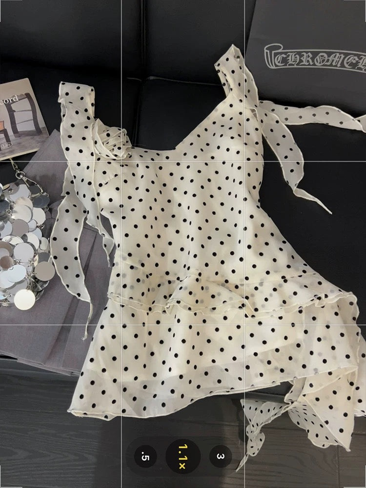 Ruffled polka dot camisole for women, asymmetrical ribbon design, unique summer style, three-dimensional floral pattern, versatile top.