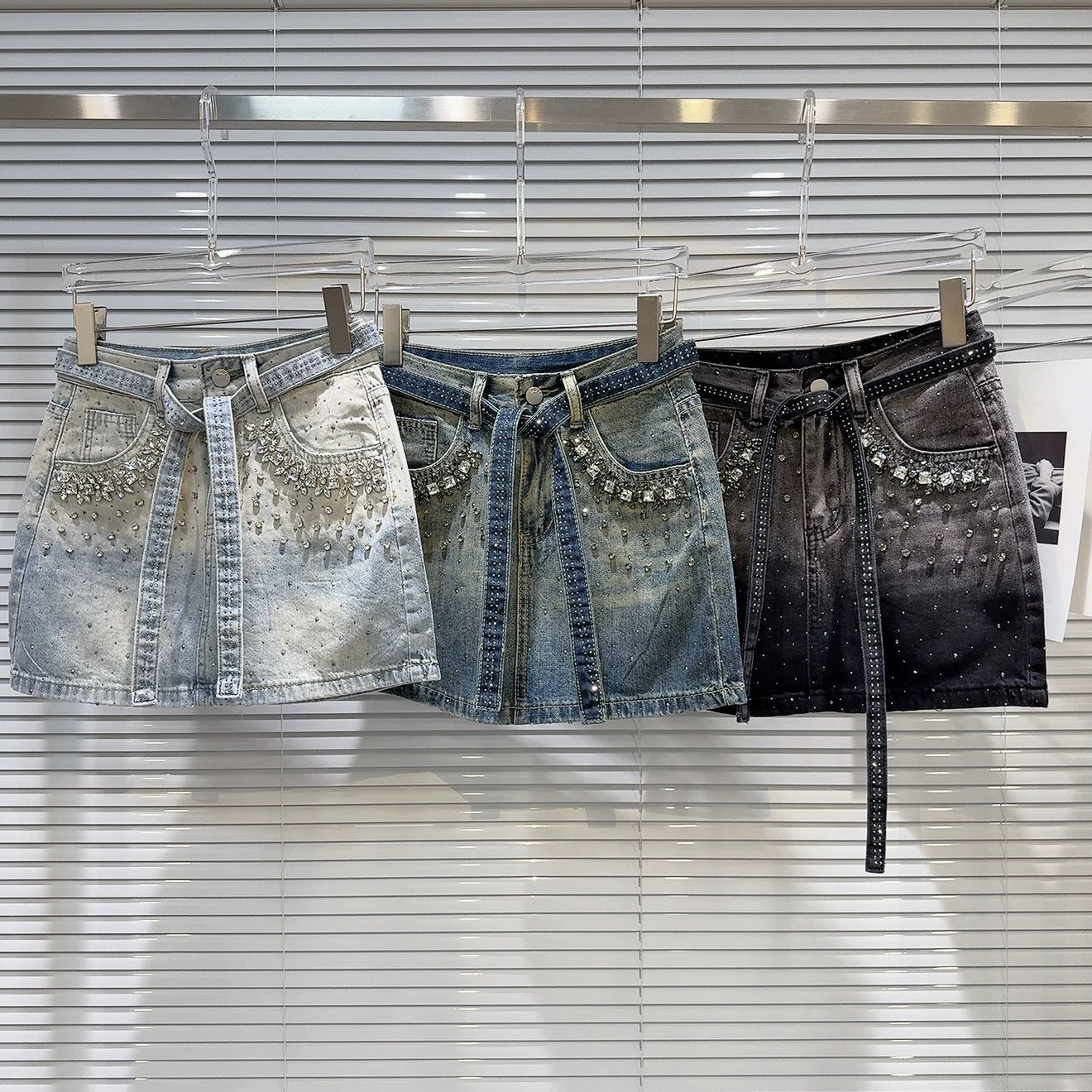 Internet celebrity same style 2025 summer new street hot girl rhinestone beaded strap heavy denim short skirt A-line skirt female