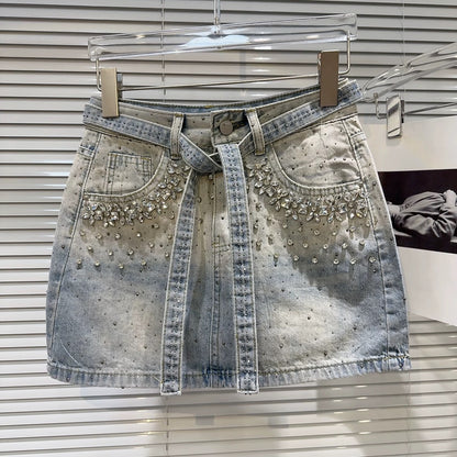 Internet celebrity same style 2025 summer new street hot girl rhinestone beaded strap heavy denim short skirt A-line skirt female