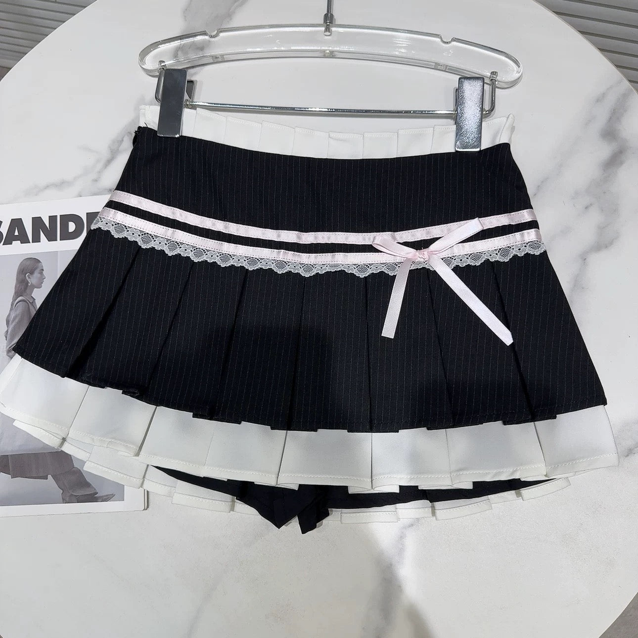 Internet celebrity same style 2025 summer new style small fragrance style bow lace straps sweet girl striped pleated skirt skirt