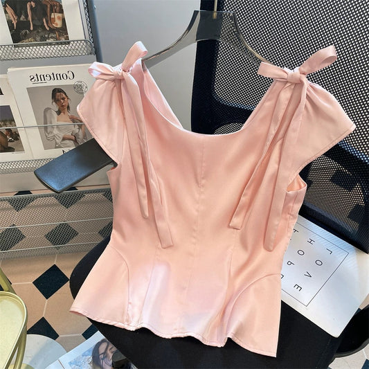 Pink, sophisticated satin shirt with bow tie, unisex, summer style, sweet and elegant, fitted waist, flutter sleeves, tulip-shaped top.