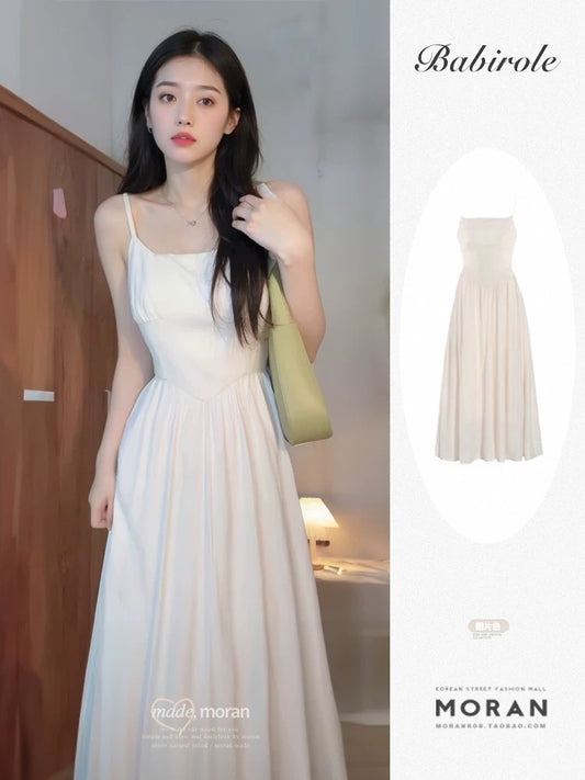 Korean temperament white suspender dress 2025 new summer tea break French style gentle style waist slimming long skirt