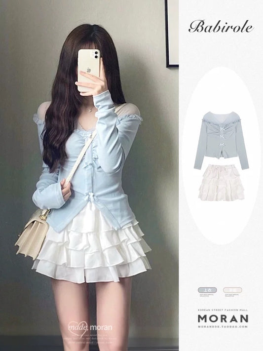 Pure desire sweet and spicy style with a complete set of slim-fitting tops, sweaters, ballet fluffy cake skirts, two-piece suits for women