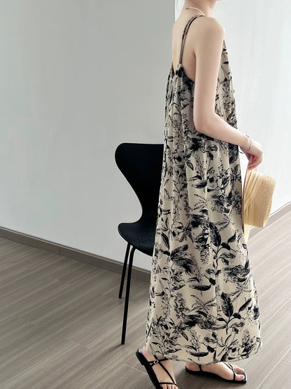 V-neck floral suspender dress women's summer tea break French seaside vacation ink print lazy style long skirt