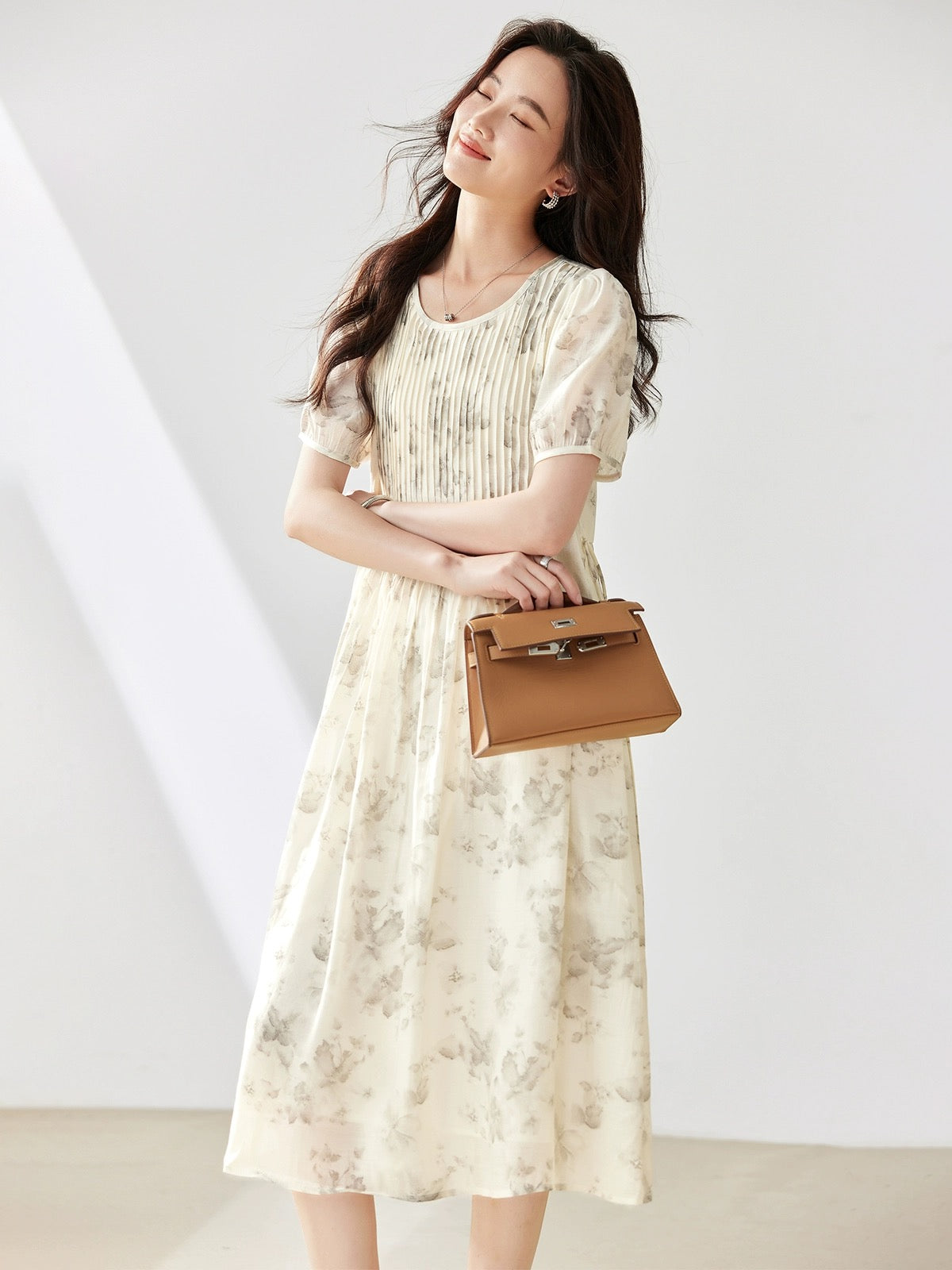 Printed accordion pleated short-sleeved dress for women summer 2024 new European style loose and fashionable temperament slim a-line skirt