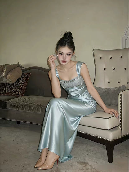 DANA Vietnamese-style satin evening gown – a sophisticated, empire-waist slip dress featuring intricate, heavy-duty beadwork and rhinestone embellishments; perfect for an engagement.