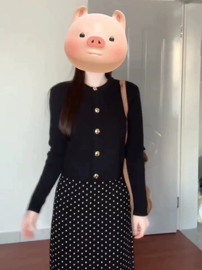 Korean chic two-piece set for early autumn 2025: knitted cardigan sweater and retro polka dot maxi skirt.