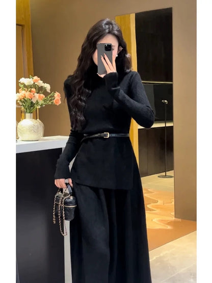 A stylish 2025 new winter outfit: a sophisticated two-piece set featuring a knitted top and a long skirt.