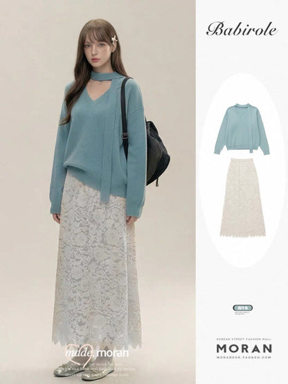 A stunningly beautiful Korean-style two-piece outfit featuring a blue sweater and lace skirt, perfect for autumn and winter.