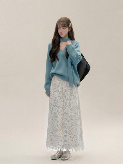 A stunningly beautiful Korean-style two-piece outfit featuring a blue sweater and lace skirt, perfect for autumn and winter.