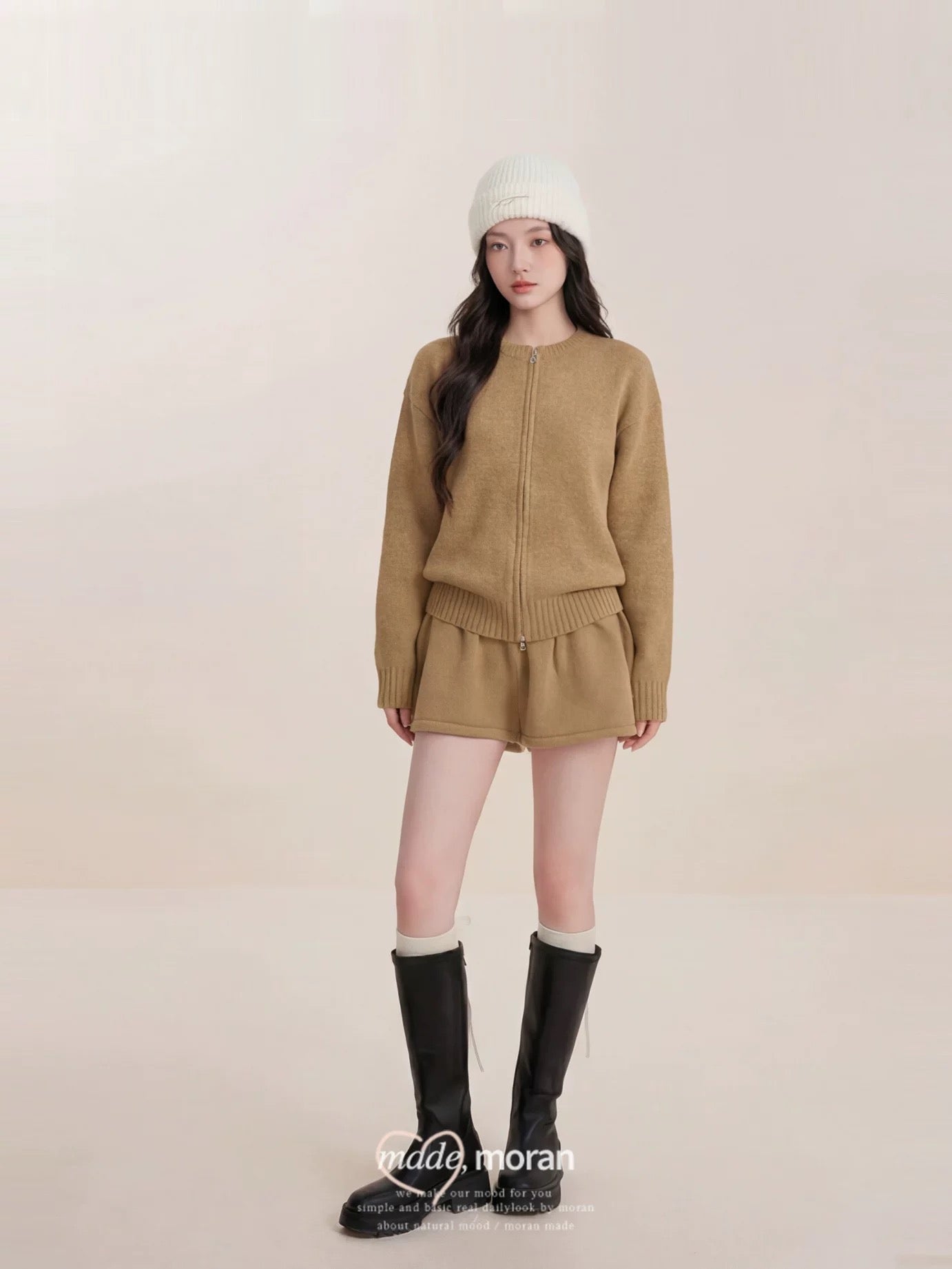 This is a super stylish Korean-style sweater and skirt set that's youthful, chic, and effortlessly luxurious.