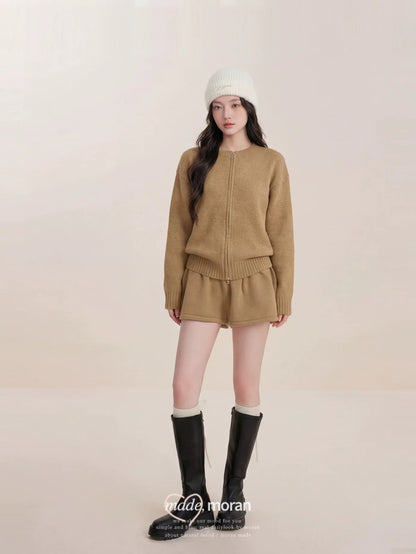 This is a super stylish Korean-style sweater and skirt set that's youthful, chic, and effortlessly luxurious.