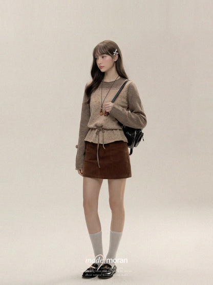 Korean-style autumn/winter outfit set: a relaxed, two-piece look with a high-waisted skirt and a top.