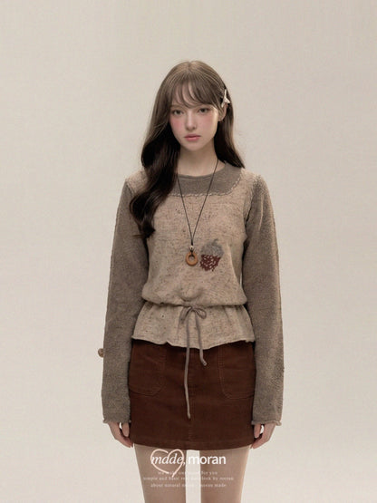 Korean-style autumn/winter outfit set: a relaxed, two-piece look with a high-waisted skirt and a top.