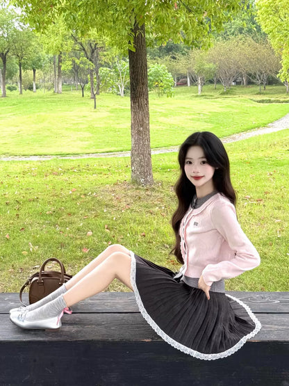 Korean-style autumn OOTD outfit: A unique and stunning two-piece set featuring a faux two-piece knit sweater and skirt.