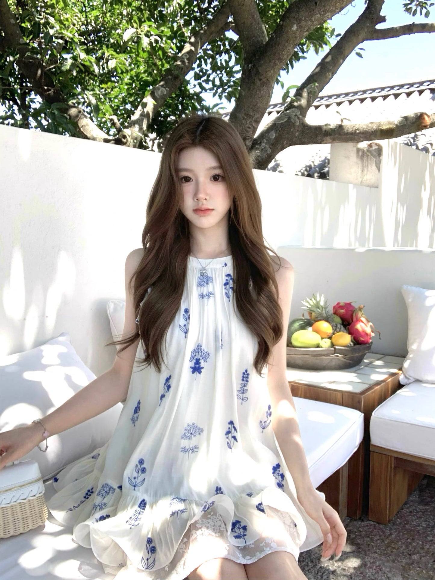 Q-Girl's Collection: Sleeveless A-line dress featuring a blue-and-white ink wash floral print, delicate lace, and a soft blue palette—an elegant summer choice for petite women.
