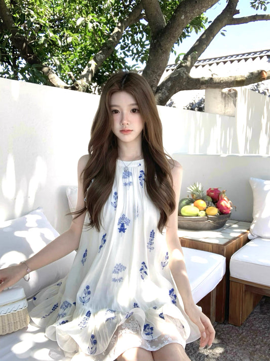Q-Girl's Collection: Sleeveless A-line dress featuring a blue-and-white ink wash floral print, delicate lace, and a soft blue palette—an elegant summer choice for petite women.