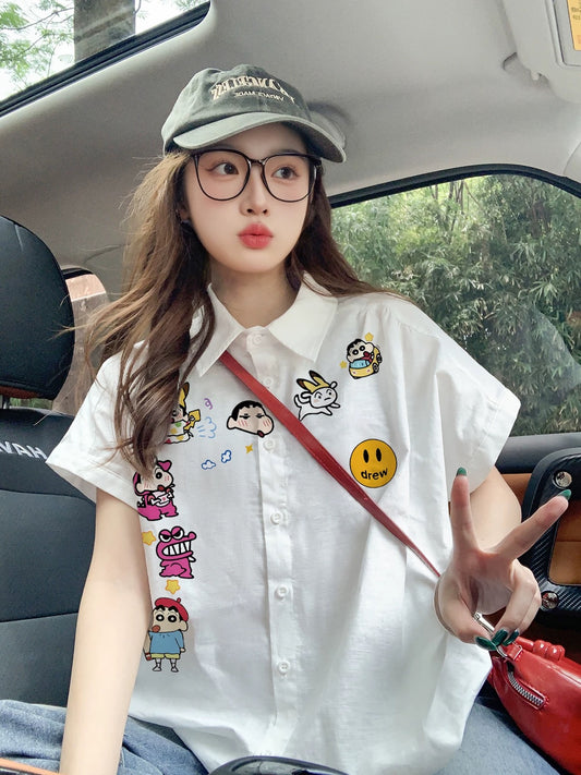 Trendy cartoon white short-sleeved shirt for women, loose and relaxed style, unique design with flutter sleeves, perfect for summer.