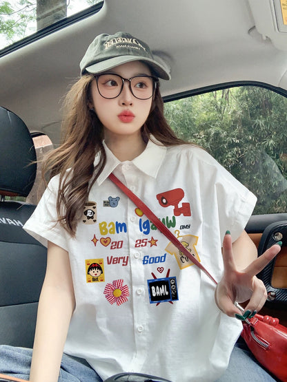 Women's white short-sleeved shirt with cartoon shoulder design, summer loose retro style, youthful and casual, suitable for couples.
