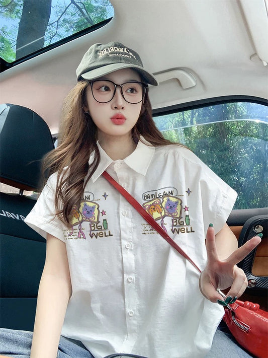 White, lightweight, short-sleeved, off-the-shoulder shirt for women, perfect for summer, loose fit, relaxed style, trendy and youthful look.