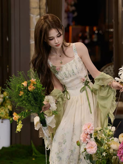 TUNTUN Spring/Summer "Green Vine Sprite" French-style camisole dress featuring a botanical print and a pastoral, forest-inspired aesthetic.