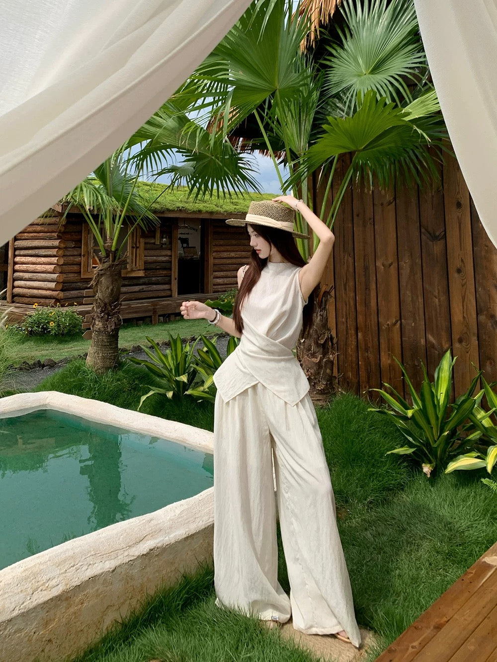 Fashion temperament suit design niche cross waist round neck vest women summer loose casual pants two-piece suit