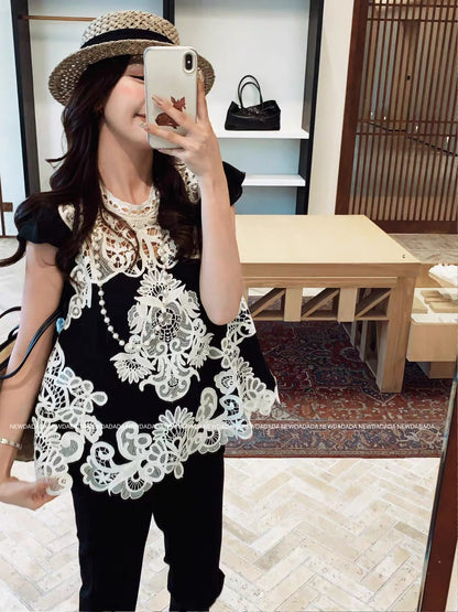 Lida NEW DADADA [Elegant & Graceful] French-style loose lace T-shirt for women – a stylish top featuring a cut-out design.