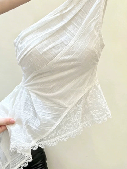Exquisite white asymmetrical lace one-shoulder tank top—a new summer style designed to flatter the figure and create a youthful look.